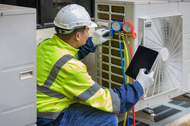 Professional Air Duct Cleaning technician working in Lima, OH